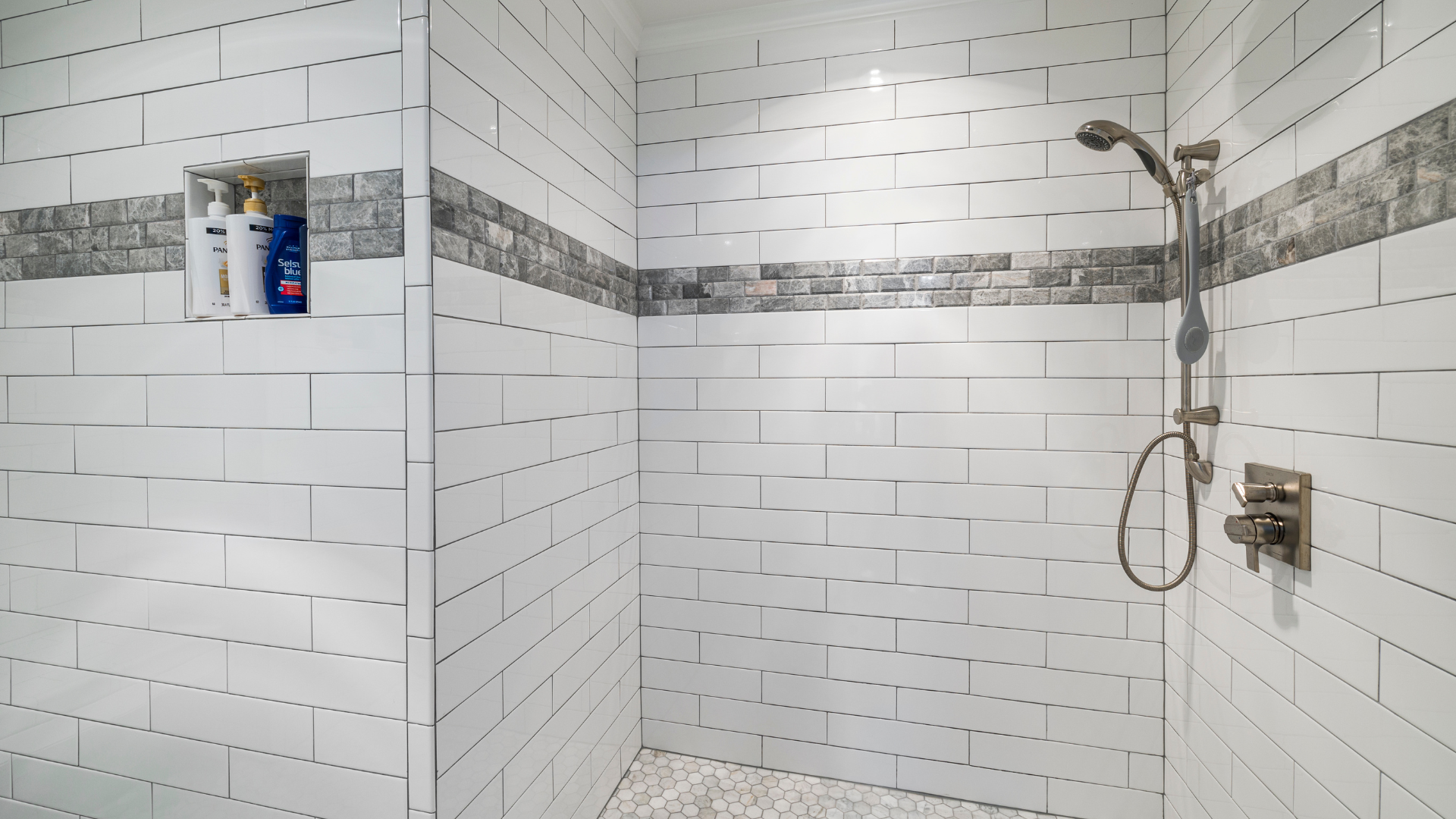 Bathroom Drain Cleaning — professional plumber at work