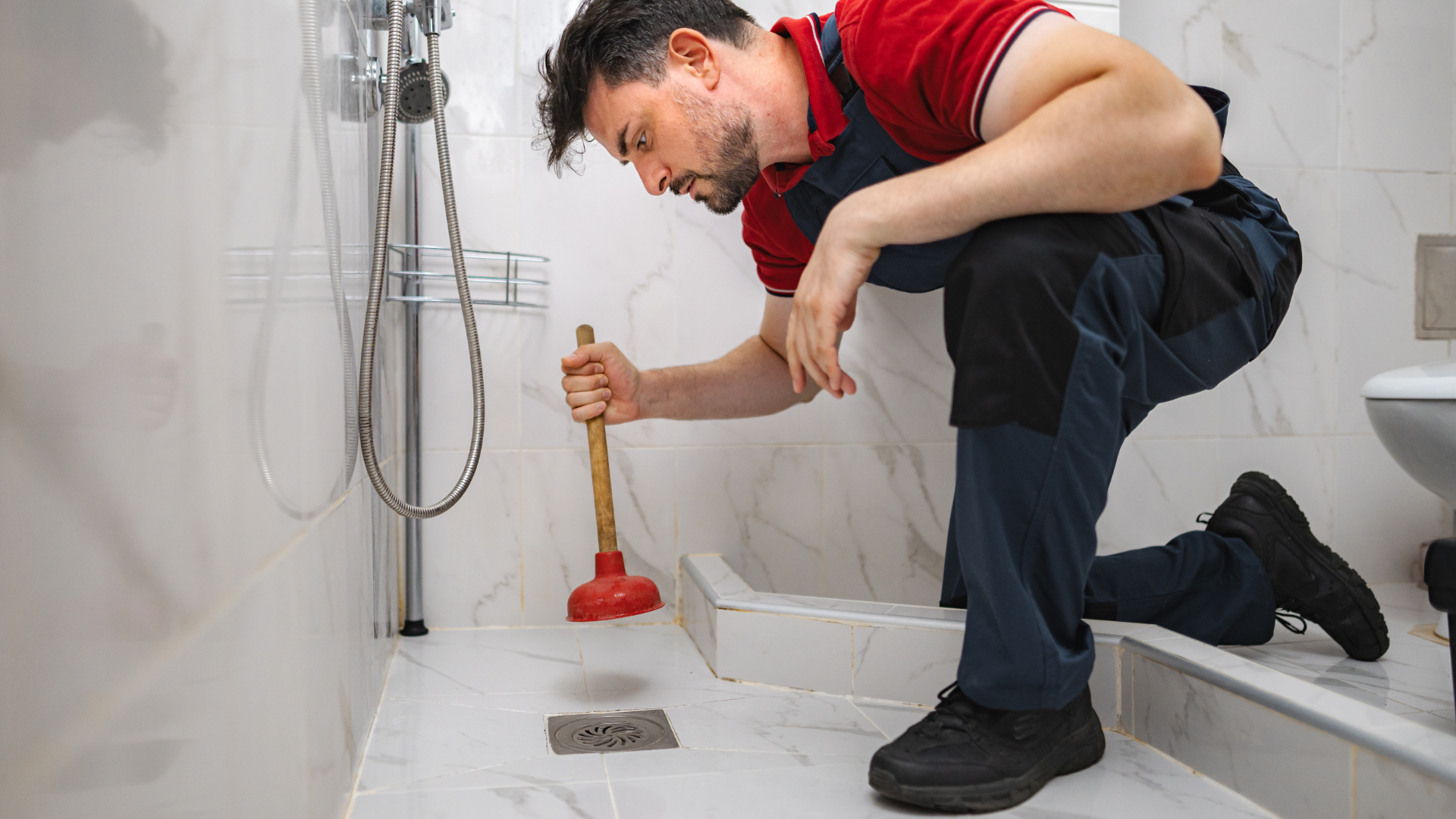 Clogged Drain Repair — professional plumber at work