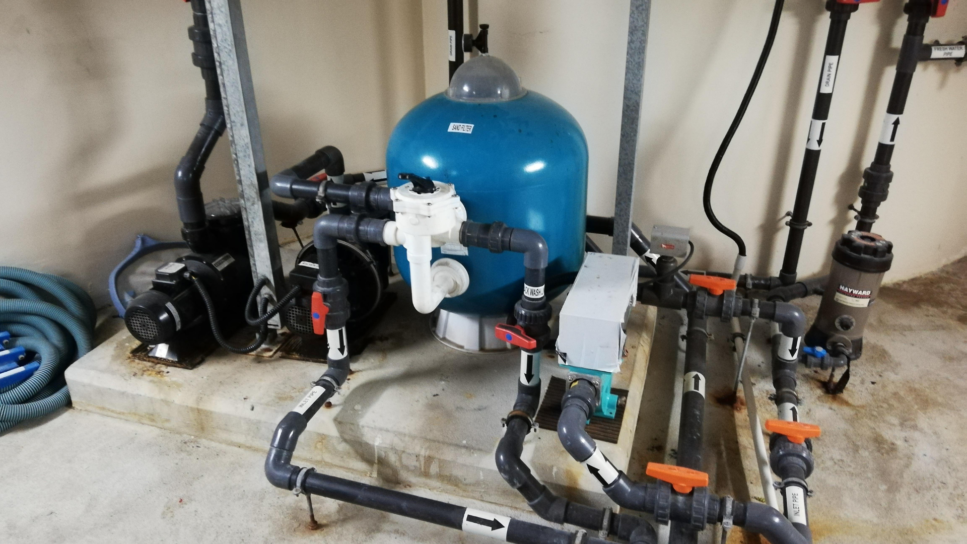 Sump Pump Services — professional plumber at work